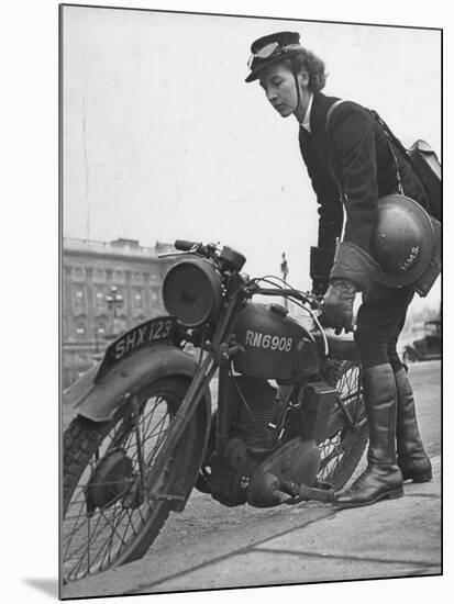 Woman Dispatch Rider Standing Beside Her Motorcycle-Hans Wild-Mounted Photographic Print