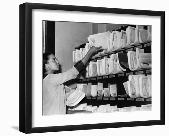 Woman Distributing Policies for Mailing-null-Framed Photographic Print