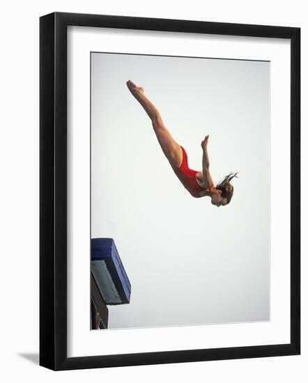 Woman Diver Flying Through the Air, California, USA-Paul Sutton-Framed Photographic Print