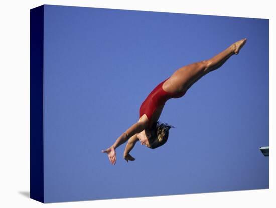 Woman Diver Flying Through the Air-null-Stretched Canvas
