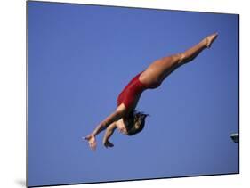 Woman Diver Flying Through the Air-null-Mounted Photographic Print