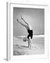 Woman Does Handstand on the Beach (B&W)-Hulton Archive-Framed Photographic Print