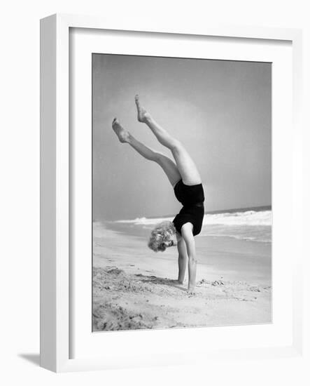 Woman Does Handstand on the Beach (B&W)-Hulton Archive-Framed Photographic Print