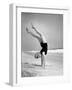 Woman Does Handstand on the Beach (B&W)-Hulton Archive-Framed Photographic Print