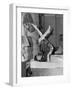 Woman Doing Yoga on Bed-null-Framed Photo