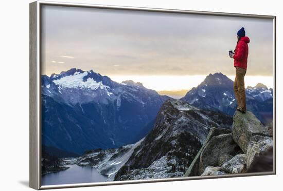 Woman Drinks Her Coffee On Top Of A Mountain In The Morning Looking Out Into The Cascade Mts In WA-Hannah Dewey-Framed Photographic Print