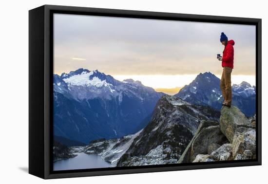 Woman Drinks Her Morning Coffee On Top Of A Mountain In The North Cascades-Hannah Dewey-Framed Stretched Canvas