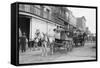 Woman Driving Horse-Drawn Wagon on Street-null-Framed Stretched Canvas