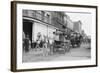 Woman Driving Horse-Drawn Wagon on Street-null-Framed Photographic Print