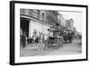 Woman Driving Horse-Drawn Wagon on Street-null-Framed Photographic Print