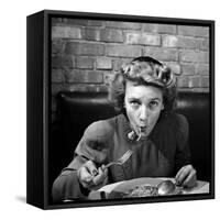 Woman Eating Spaghetti in Restaurant. No.5 of Sequence of 6-Alfred Eisenstaedt-Framed Stretched Canvas