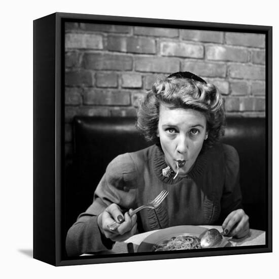 Woman Eating Spaghetti in Restaurant. No.5 of Sequence of 6-Alfred Eisenstaedt-Framed Stretched Canvas