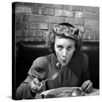 Woman Eating Spaghetti in Restaurant. No.5 of Sequence of 6-Alfred Eisenstaedt-Stretched Canvas