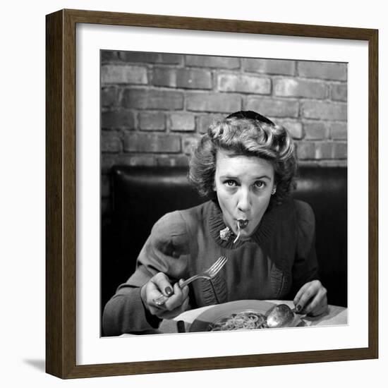 Woman Eating Spaghetti in Restaurant. No.5 of Sequence of 6-Alfred Eisenstaedt-Framed Photographic Print