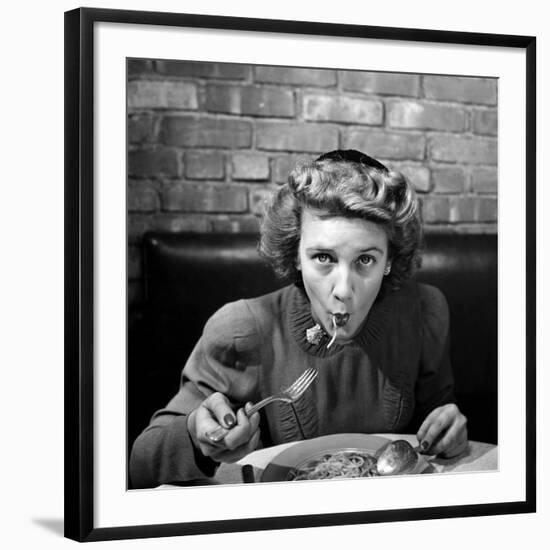 Woman Eating Spaghetti in Restaurant. No.5 of Sequence of 6-Alfred Eisenstaedt-Framed Photographic Print