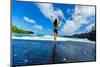 Woman enjoying the sun on one of Maui's black sand beaches, Hawaii-Laura Grier-Mounted Photographic Print