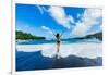 Woman enjoying the sun on one of Maui's black sand beaches, Maui, Hawaii-Laura Grier-Framed Photographic Print