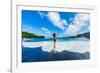 Woman enjoying the sun on one of Maui's black sand beaches, Maui, Hawaii-Laura Grier-Framed Photographic Print