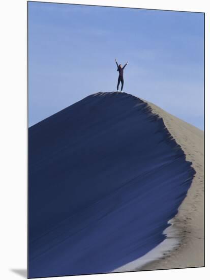 Woman Exercising on the Top of a Sand Dune-null-Mounted Photographic Print