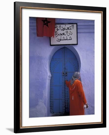 Woman Exits thru Moorish-Style Blue Door, Morocco-Merrill Images-Framed Photographic Print