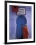 Woman Exits thru Moorish-Style Blue Door, Morocco-Merrill Images-Framed Photographic Print