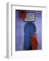 Woman Exits thru Moorish-Style Blue Door, Morocco-Merrill Images-Framed Photographic Print