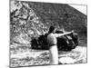 Woman Firing a Revolver-null-Mounted Photographic Print