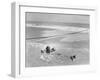 Woman Floating in a Large Puddle of Water Near the Surf While at the Beach-Wallace G^ Levison-Framed Photographic Print