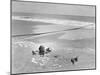 Woman Floating in a Large Puddle of Water Near the Surf While at the Beach-Wallace G^ Levison-Mounted Photographic Print
