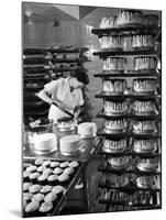 Woman Frosting Cakes at Schrafft's in Rockefeller Center-Cornell Capa-Mounted Photographic Print