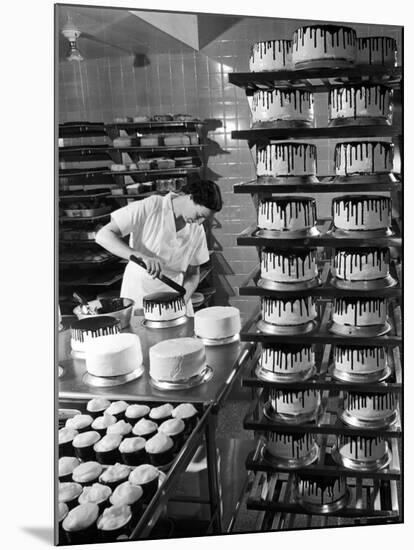 Woman Frosting Cakes at Schrafft's in Rockefeller Center-Cornell Capa-Mounted Photographic Print