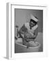 Woman Giving a Baby a Bath at a Nursery-null-Framed Photographic Print
