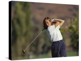 Woman Golfer in Action-Chris Trotman-Stretched Canvas