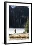 Woman Hiker Walks Alongside A Frozen Lake In The Olympic Mountain High Country During Winter In WA-Hannah Dewey-Framed Photographic Print