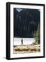 Woman Hiker Walks Alongside A Frozen Lake In The Olympic Mountain High Country During Winter In WA-Hannah Dewey-Framed Photographic Print