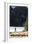 Woman Hiker Walks Alongside A Frozen Lake In The Olympic Mountain High Country During Winter In WA-Hannah Dewey-Framed Photographic Print