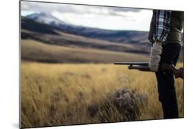 Woman Hold Her Shotgun While Out Bird Hunting In Montana-Hannah Dewey-Mounted Photographic Print