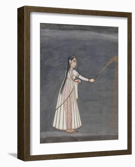 Woman Holding a Sparkler-null-Framed Art Print