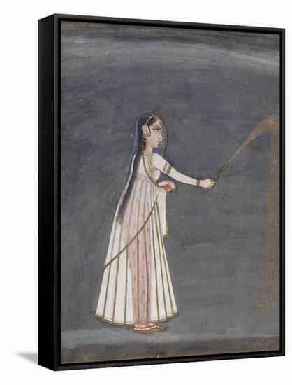 Woman Holding a Sparkler-null-Framed Stretched Canvas