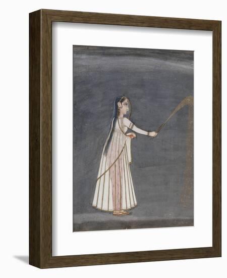 Woman Holding a Sparkler-null-Framed Art Print