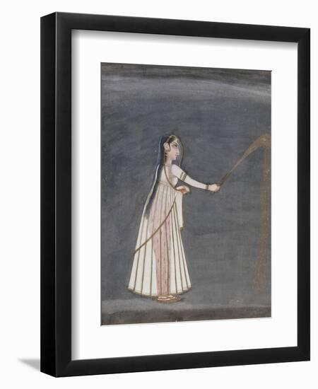 Woman Holding a Sparkler-null-Framed Art Print