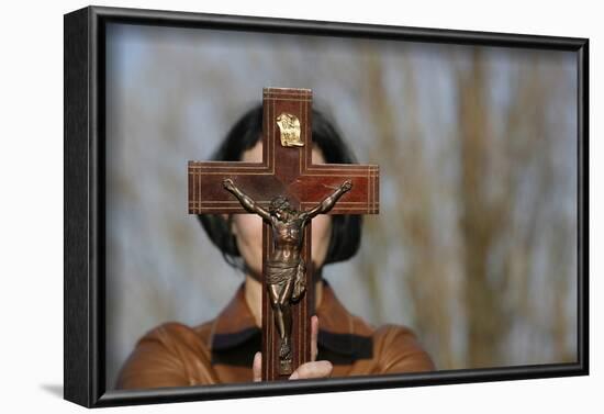 Woman holding forth a crucifix, Isere, France-Godong-Framed Photographic Print