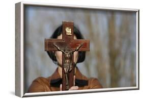 Woman holding forth a crucifix, Isere, France-Godong-Framed Photographic Print