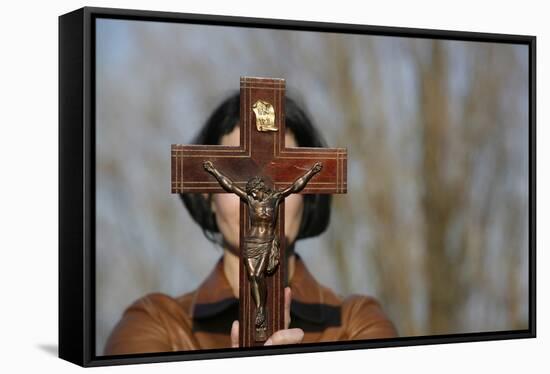 Woman holding forth a crucifix, Isere, France-Godong-Framed Stretched Canvas