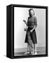 Woman Holding Golf Club and Golf Bag-Philip Gendreau-Framed Stretched Canvas