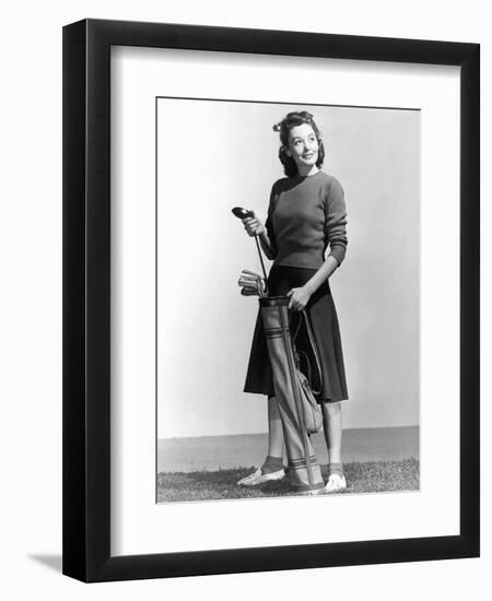 Woman Holding Golf Club and Golf Bag-Philip Gendreau-Framed Photographic Print