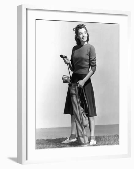 Woman Holding Golf Club and Golf Bag-Philip Gendreau-Framed Photographic Print