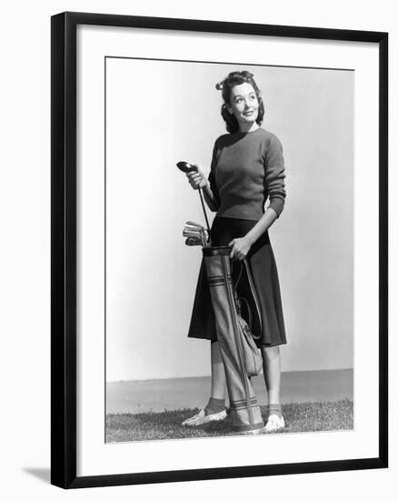 Woman Holding Golf Club and Golf Bag-Philip Gendreau-Framed Photographic Print