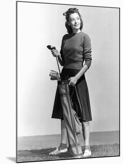 Woman Holding Golf Club and Golf Bag-Philip Gendreau-Mounted Photographic Print