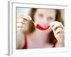 Woman Holding out a Red Chili Pepper-Maren Brinkmann-Framed Photographic Print